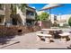 Outdoor grills and seating create a welcoming space for residents to gather and enjoy outdoor cooking at 2228 N 52Nd St # 227, Phoenix, AZ 85008
