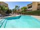 This community offers a refreshing pool, lounge chairs, and lush greenery for residents to relax at 2228 N 52Nd St # 227, Phoenix, AZ 85008