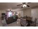 The home features an open-concept living and dining space with tile floors and modern furnishings at 2228 N 52Nd St # 227, Phoenix, AZ 85008