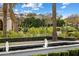 An attractive fountain surrounded by lush landscaping enhances the exterior of this estate at 7533 N 70Th St, Paradise Valley, AZ 85253