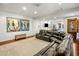 Open-concept living room with modern artwork, comfortable seating, and hardwood floors at 7533 N 70Th St, Paradise Valley, AZ 85253