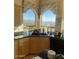 Kitchen with granite countertops, wood cabinets and a view at 11519 E Blue Wash Rd, Cave Creek, AZ 85331