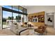 Open living space with built-in shelving and backyard access at 6554 N 40Th Pl, Paradise Valley, AZ 85253