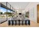Spacious living area with large windows and a fireplace at 6554 N 40Th Pl, Paradise Valley, AZ 85253