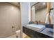 Modern bathroom with floating vanity and sleek fixtures at 41327 N 106Th St, Scottsdale, AZ 85262