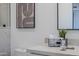 Vanity with marble countertop and modern fixtures at 41327 N 106Th St, Scottsdale, AZ 85262