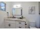 Modern bathroom with white vanity and marble at 41327 N 106Th St, Scottsdale, AZ 85262