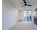 Bright bedroom with sliding glass doors and barn door at 41327 N 106Th St, Scottsdale, AZ 85262