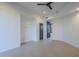 Spacious bedroom with tile floors and sliding door access to the outdoors at 41327 N 106Th St, Scottsdale, AZ 85262