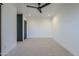 Light and airy bedroom with carpeted floors at 41327 N 106Th St, Scottsdale, AZ 85262