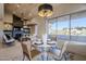 Casual dining area with scenic views from large windows at 41327 N 106Th St, Scottsdale, AZ 85262
