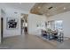 Modern dining room with a wood table and access to a patio at 41327 N 106Th St, Scottsdale, AZ 85262