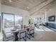 Spacious dining area with modern light fixture and fireplace at 41327 N 106Th St, Scottsdale, AZ 85262