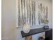 Contemporary entry table with decorative art and accessories at 41327 N 106Th St, Scottsdale, AZ 85262