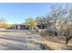 Modern home with a three-car garage and desert landscaping at 41327 N 106Th St, Scottsdale, AZ 85262