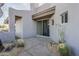 Private exterior entry with desert landscaping and lighting at 41327 N 106Th St, Scottsdale, AZ 85262