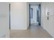 Bright hallway with tile floors and built-in storage at 41327 N 106Th St, Scottsdale, AZ 85262