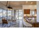 Modern kitchen with breakfast bar and patio access at 41327 N 106Th St, Scottsdale, AZ 85262