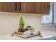 Kitchen detail showing a quartz countertop and wooden cabinets at 41327 N 106Th St, Scottsdale, AZ 85262