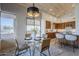 Modern kitchen with breakfast nook and wood cabinets at 41327 N 106Th St, Scottsdale, AZ 85262