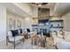 Modern living room featuring a fireplace and comfy seating at 41327 N 106Th St, Scottsdale, AZ 85262