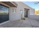 Small patio area with desert landscaping and exterior lighting at 41327 N 106Th St, Scottsdale, AZ 85262