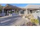 Large patio area with water feature and desert landscaping at 41327 N 106Th St, Scottsdale, AZ 85262