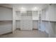 Spacious walk-in closet with ample shelving and hanging space at 41327 N 106Th St, Scottsdale, AZ 85262