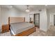 Bright bedroom featuring a tufted headboard, modern chandelier, and mirrored closet at 8094 E Via Del Vencino --, Scottsdale, AZ 85258