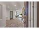 Welcoming foyer featuring updated tile flooring, recessed lighting, an art piece, and a glass accent door at 8094 E Via Del Vencino --, Scottsdale, AZ 85258