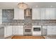 This kitchen has custom cabinetry, granite countertops, stainless steel appliances, and decorative lighting at 8094 E Via Del Vencino --, Scottsdale, AZ 85258