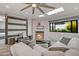 Comfortable living room with marble fireplace, skylight, and modern decor at 8094 E Via Del Vencino --, Scottsdale, AZ 85258