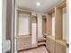 Spacious walk-in closet featuring custom wooden shelving and drawer storage for organization at 8094 E Via Del Vencino --, Scottsdale, AZ 85258