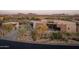 Stunning desert home showcasing modern design, desert landscaping, and a convenient driveway at 36421 N 105Th Pl, Scottsdale, AZ 85262