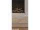 Close up of fireplace with marble hearth and detailed surround at 36421 N 105Th Pl, Scottsdale, AZ 85262