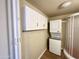 View of a bathroom with a stand up shower and convenient washer and dryer setup at 1044 S Quartz Dr, Apache Junction, AZ 85119