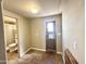 A small bathroom is conveniently located off the bonus room with laundry facilities at 1044 S Quartz Dr, Apache Junction, AZ 85119