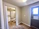 Bathroom featuring a stand up shower and a convenient stacked washer and dryer at 1044 S Quartz Dr, Apache Junction, AZ 85119