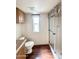 Bathroom with vanity and fixtures, a window, and walk-in shower at 1044 S Quartz Dr, Apache Junction, AZ 85119