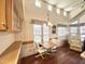 Hardwood flooring, large windows, and built in cabinetry make this dining area inviting at 1044 S Quartz Dr, Apache Junction, AZ 85119