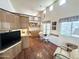 Open kitchen and dining area with laminate floors, a loft and plenty of natural light at 1044 S Quartz Dr, Apache Junction, AZ 85119