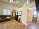 Living room featuring unique flooring, lots of light, ceiling fan and lofted space at 1044 S Quartz Dr, Apache Junction, AZ 85119