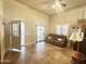 Open living room with plenty of space, bright light, door to the patio and unique flooring at 1044 S Quartz Dr, Apache Junction, AZ 85119