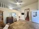 Living room featuring stairs to the second floor, unique flooring, and lots of light at 1044 S Quartz Dr, Apache Junction, AZ 85119