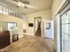 Living room featuring stairs to the second floor, unique flooring, and lots of light at 1044 S Quartz Dr, Apache Junction, AZ 85119