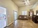 Bright living room featuring door to the patio, unique flooring, and lots of light at 1044 S Quartz Dr, Apache Junction, AZ 85119