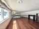 Wide open loft area with laminate floors and plenty of natural light at 1044 S Quartz Dr, Apache Junction, AZ 85119