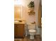 Bathroom showcasing vanity with marble countertop, toilet, decorative plant, and bath with shower at 8103 E Southern Ave # 24, Mesa, AZ 85209