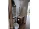 Cozy bathroom includes a toilet, sink and vanity with built-in shelving for storage at 8103 E Southern Ave # 24, Mesa, AZ 85209