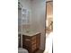 Practical bathroom featuring a vanity and built-in storage solutions at 8103 E Southern Ave # 24, Mesa, AZ 85209